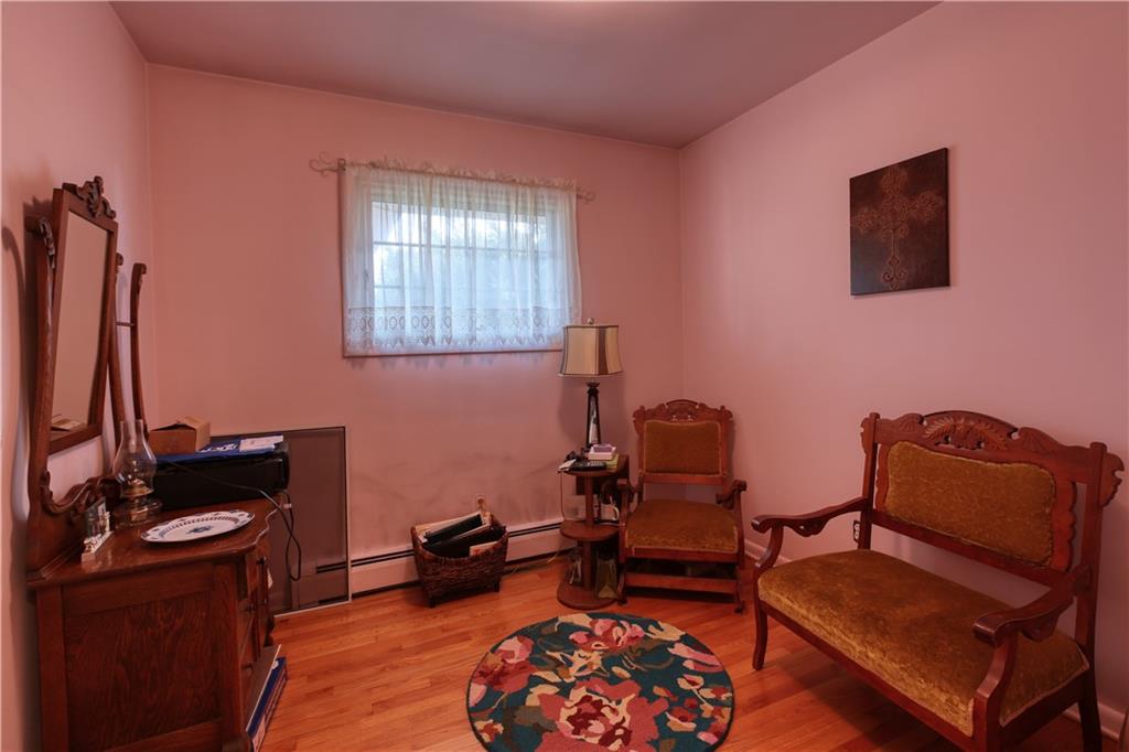 514 Pleasant Hill Road Hookstown, PA 15050 - Photo 11 of 25 a bedroom with furniture and a window