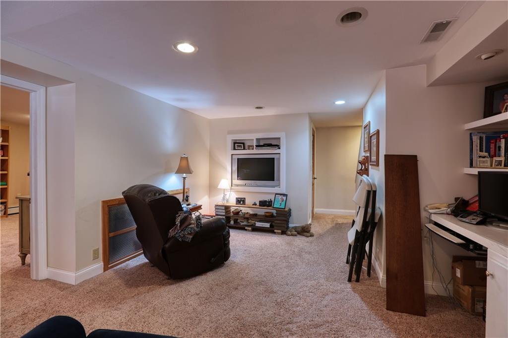 514 Pleasant Hill Road Hookstown, PA 15050 - Photo 13 of 25 a living room with furniture and a flat screen tv