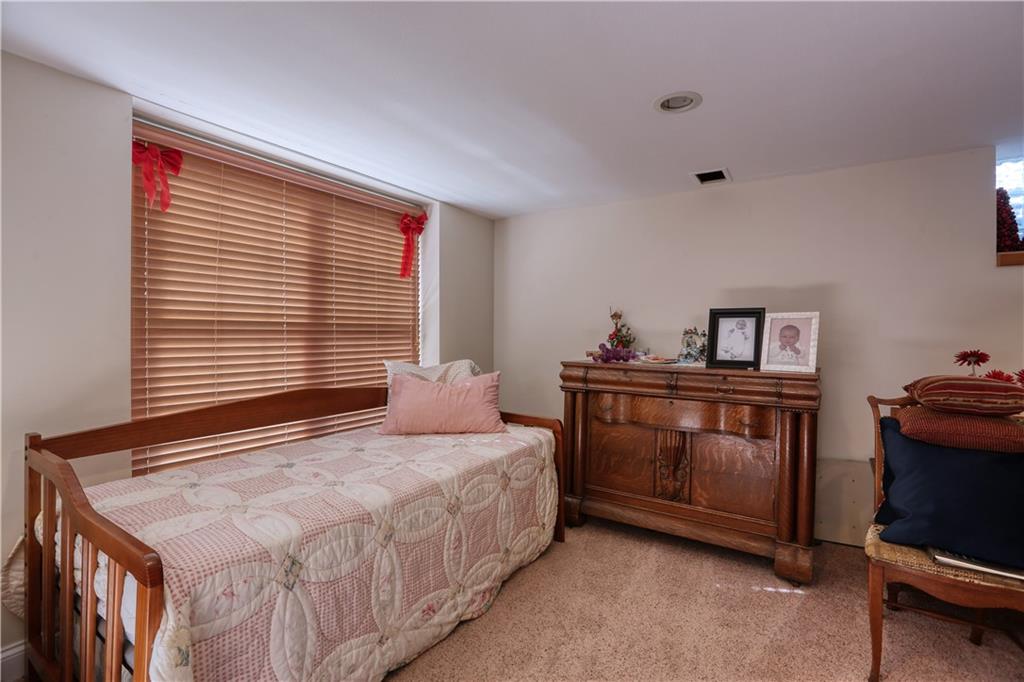 514 Pleasant Hill Road Hookstown, PA 15050 - Photo 15 of 25 a bedroom with a bed and a window