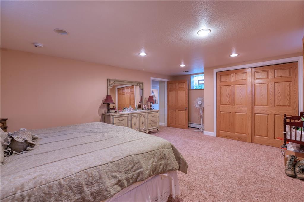 514 Pleasant Hill Road Hookstown, PA 15050 - Photo 16 of 25 a spacious bedroom with a bed and a view of bathroom
