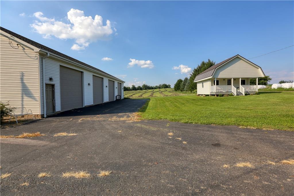 514 Pleasant Hill Road Hookstown, PA 15050 - Photo 21 of 25 a view of a house with a yard