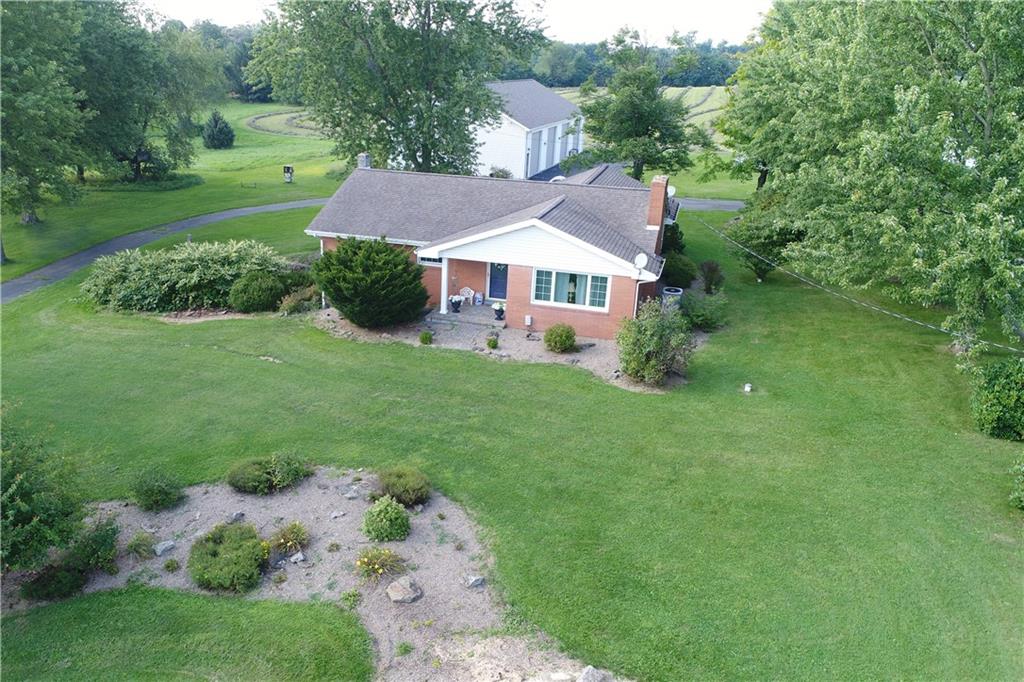 514 Pleasant Hill Road Hookstown, PA 15050 - Photo 23 of 25 a view of a house with a big yard