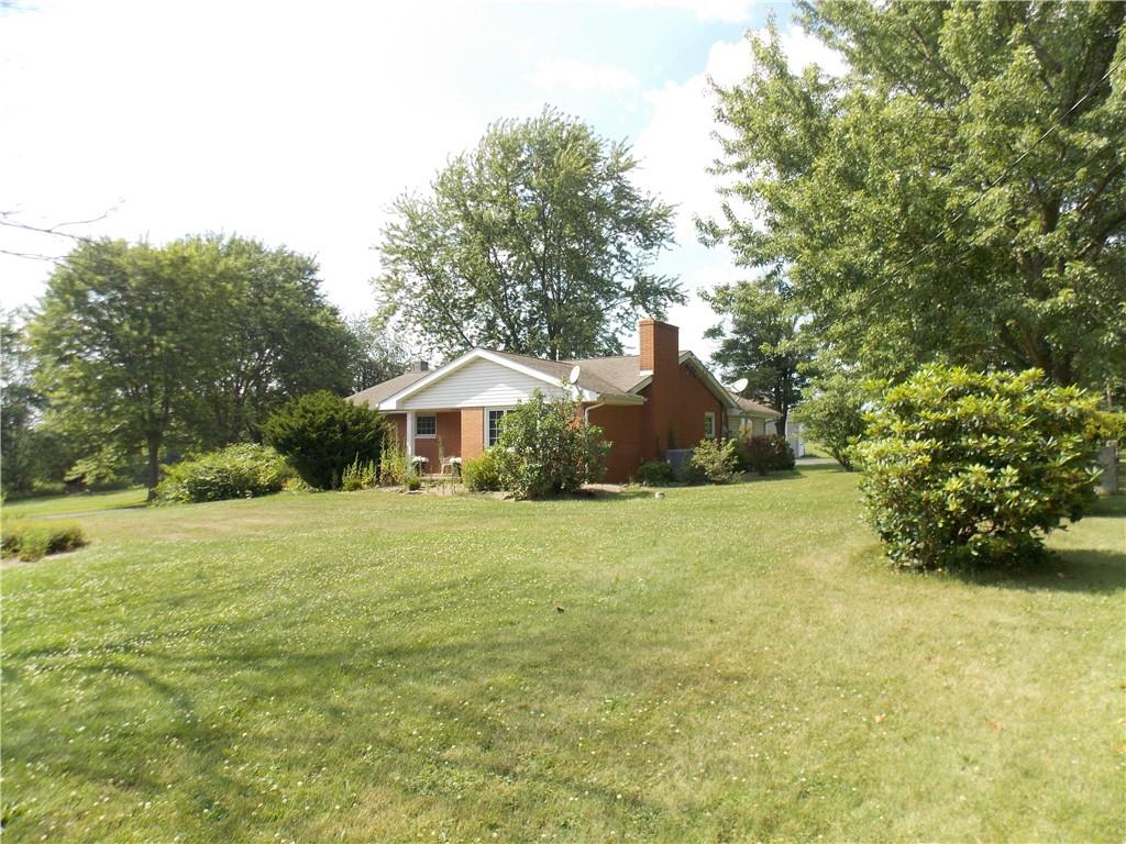 514 Pleasant Hill Road Hookstown, PA 15050 - Photo 25 of 25 a front view of a house with a yard