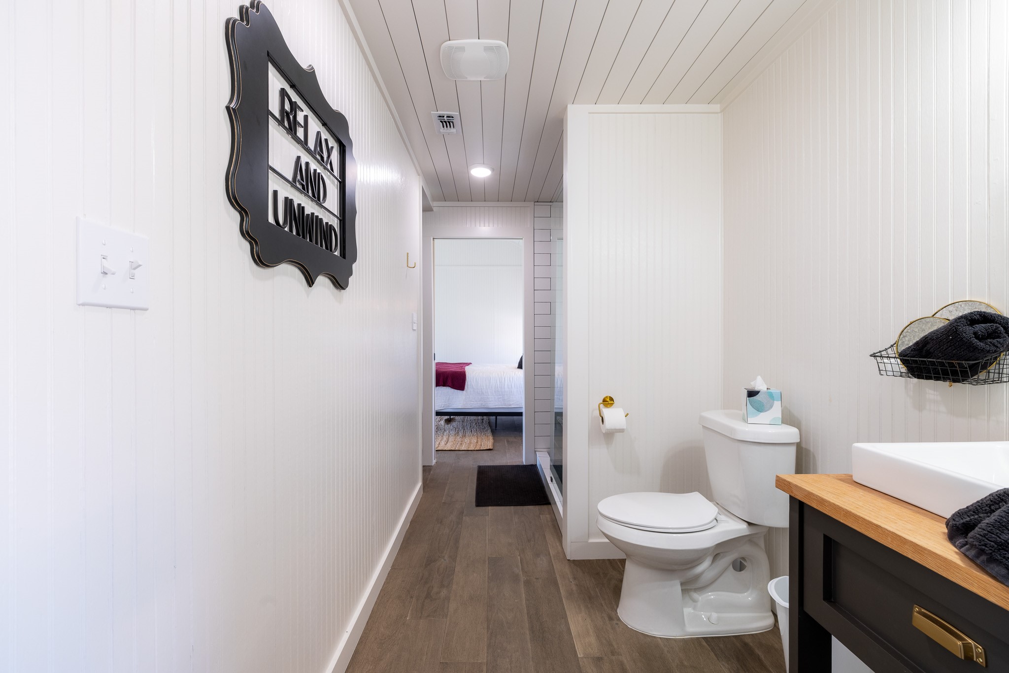 0 Goehring Road Ledbetter, TX 78946 - Photo 20 of 27 a white toilet sitting next to a bathroom sink