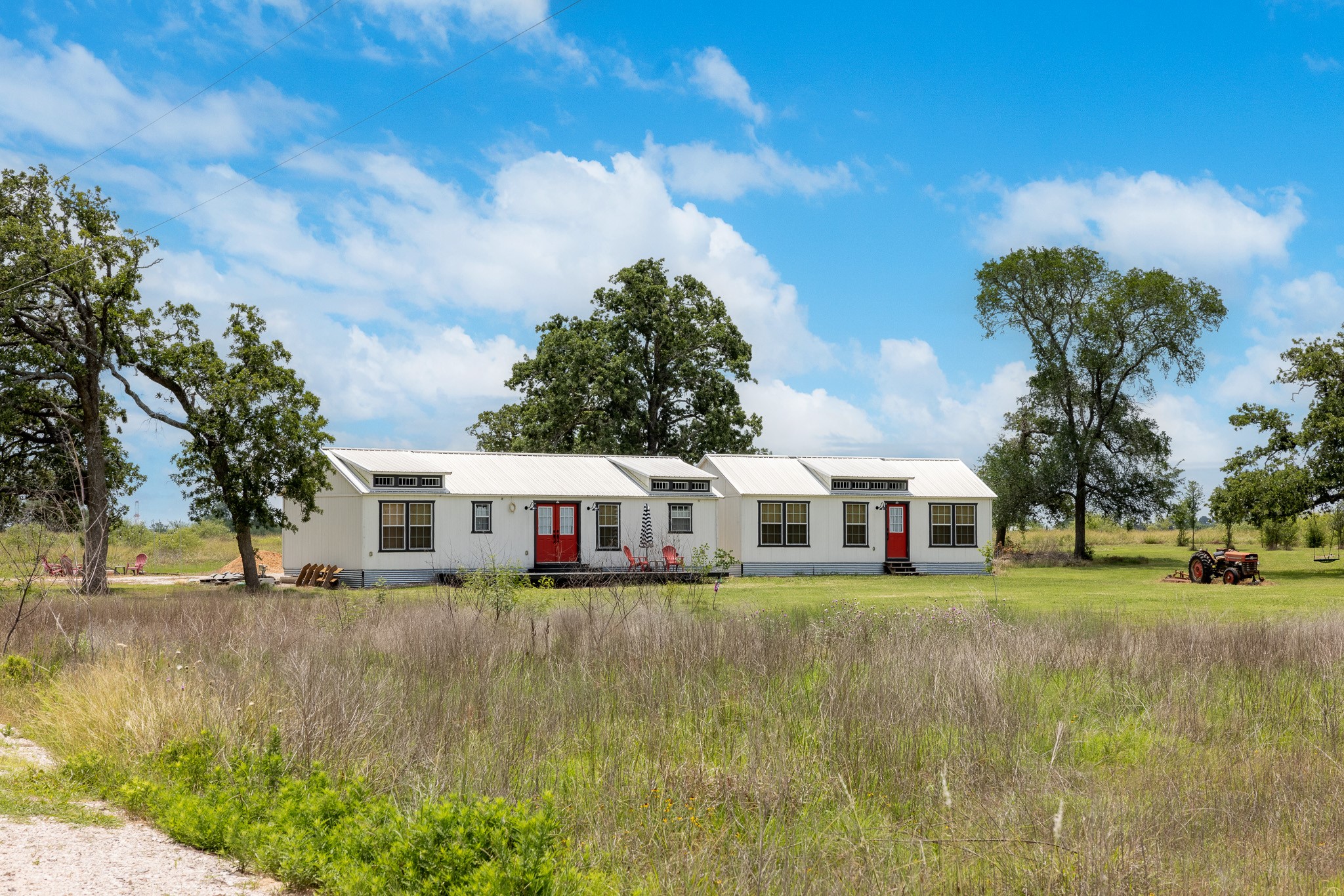 0 Goehring Road Ledbetter, TX 78946 - Photo 24 of 27 a view of a house with a big yard and large trees