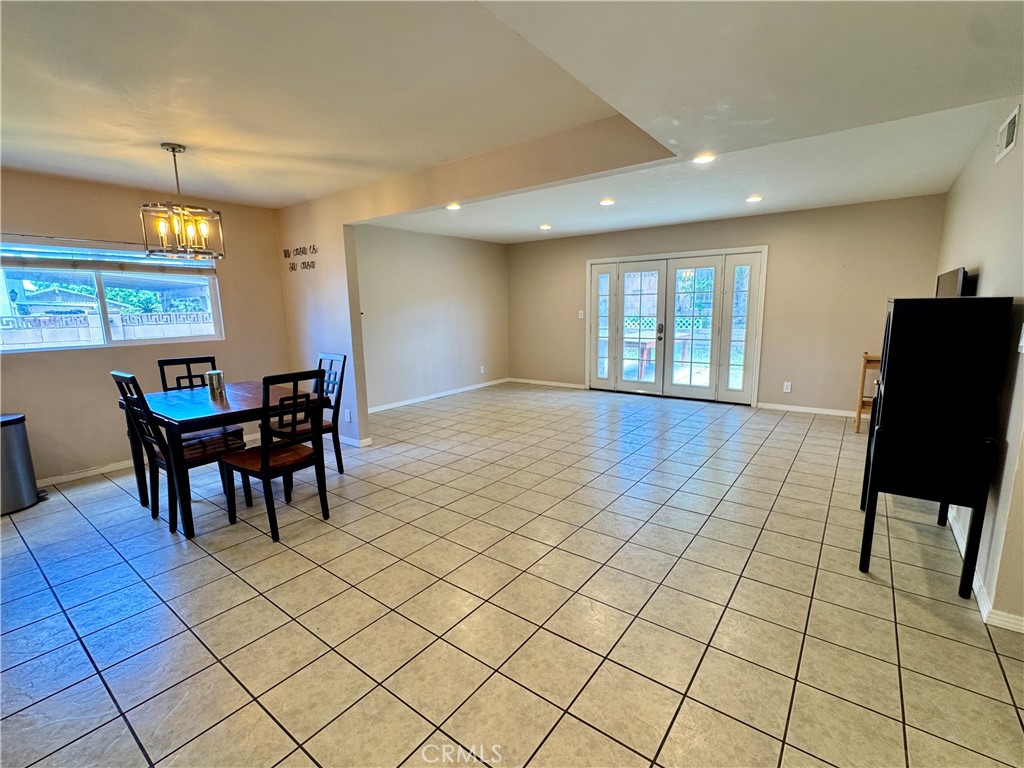 2065 Morley Street Simi Valley, CA 93065 - Photo 2 of 13 a view of a dining room with furniture and chandelier