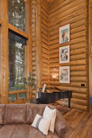 a bathroom with a granite countertop toilet a sink and mirror