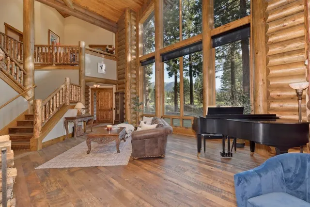 a view of a brick house with many windows