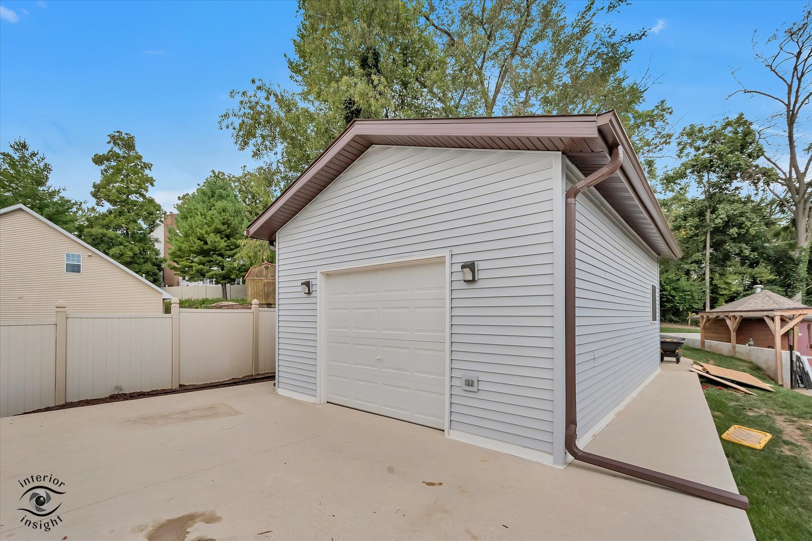2500 Beverly Way Ottawa, IL 61350 - Photo 20 of 42 a view of a white house with a yard and garage