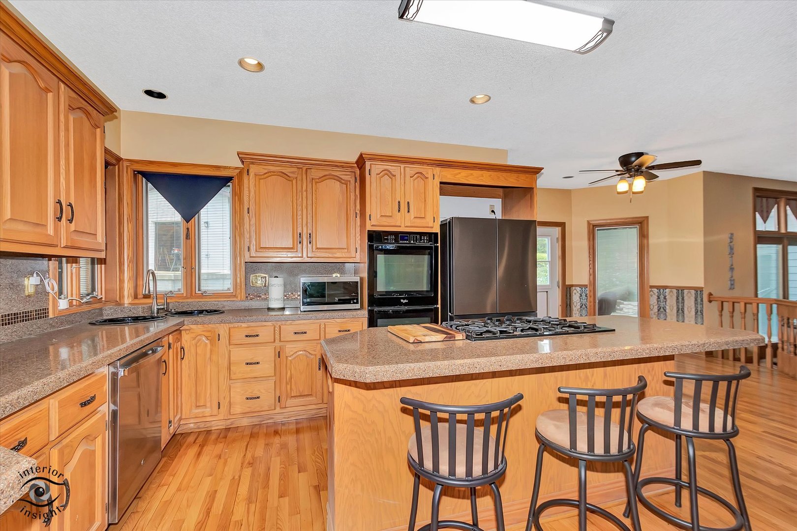 2500 Beverly Way Ottawa, IL 61350 - Photo 28 of 42 a kitchen with stainless steel appliances granite countertop a stove a sink and a refrigerator