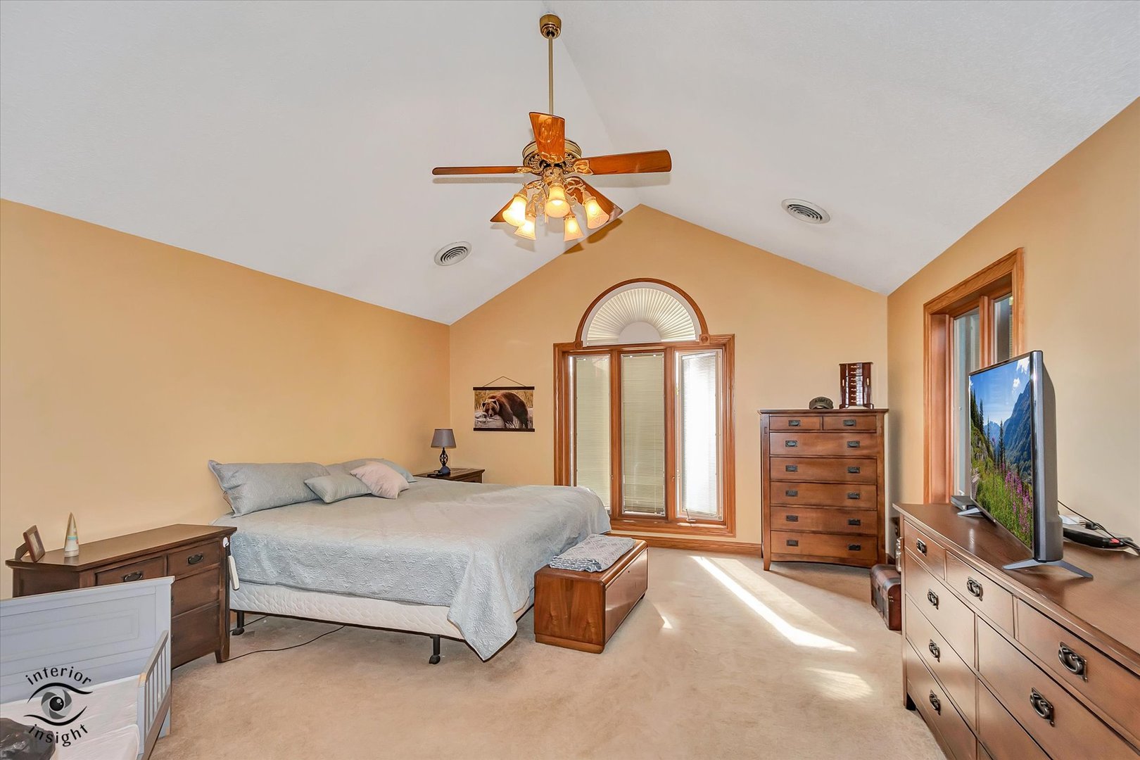 2500 Beverly Way Ottawa, IL 61350 - Photo 34 of 42 a bedroom with a bed and a flat screen tv