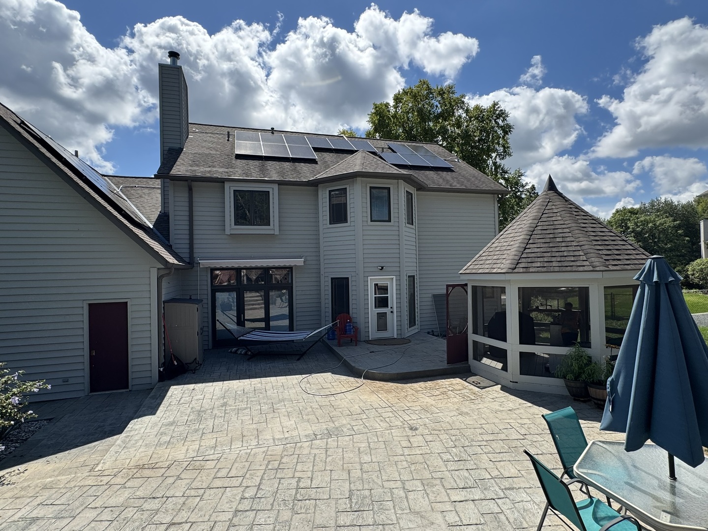 2500 Beverly Way Ottawa, IL 61350 - Photo 5 of 42 a front view of a house with a yard potted plants and wooden fence