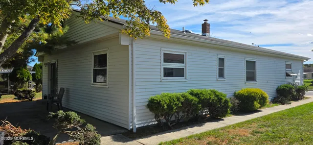 a view of a back yard of the house