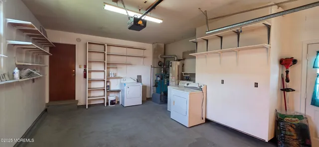 a view of a storage & utility room with closet