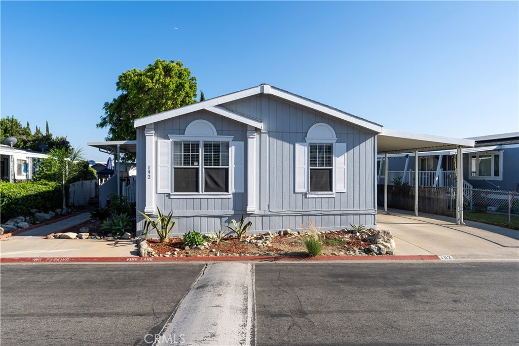 10350 Base Line Road, Unit 192 Rancho Cucamonga, CA 91701 - Photo 1 of 35 a front view of a house