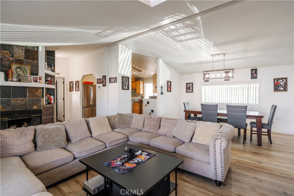 10350 Base Line Road, Unit 192 Rancho Cucamonga, CA 91701 - Photo 11 of 35 a living room with furniture and wooden floor
