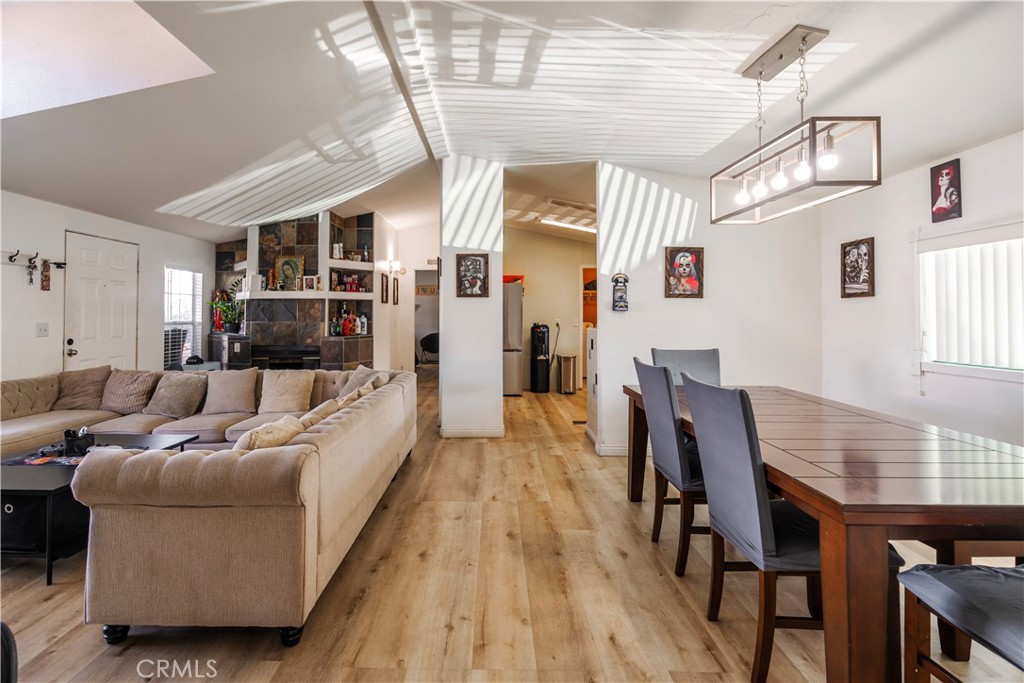 10350 Base Line Road, Unit 192 Rancho Cucamonga, CA 91701 - Photo 12 of 35 a living room with furniture and wooden floor