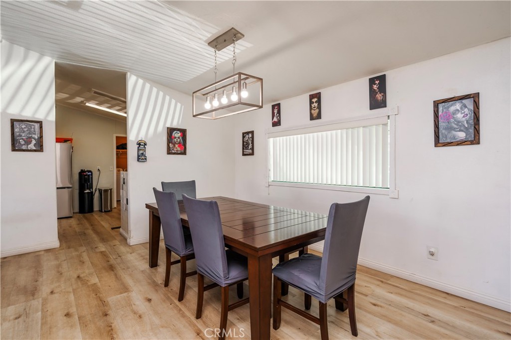 10350 Base Line Road, Unit 192 Rancho Cucamonga, CA 91701 - Photo 13 of 35 a view of a dining room with furniture