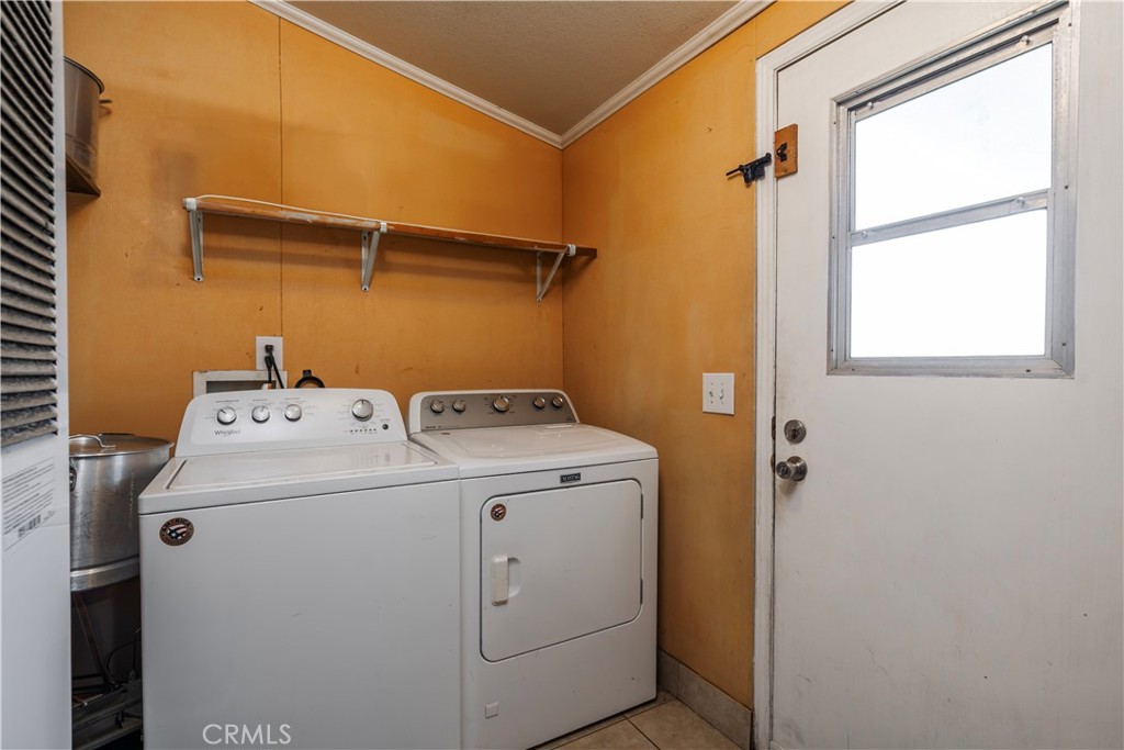 10350 Base Line Road, Unit 192 Rancho Cucamonga, CA 91701 - Photo 19 of 35 a utility room with dryer and washer