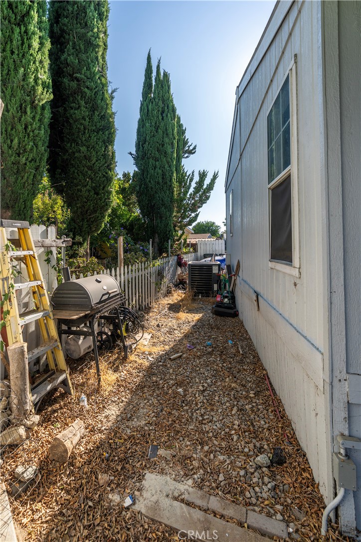 10350 Base Line Road, Unit 192 Rancho Cucamonga, CA 91701 - Photo 33 of 35 a view of house with backyard and sitting area