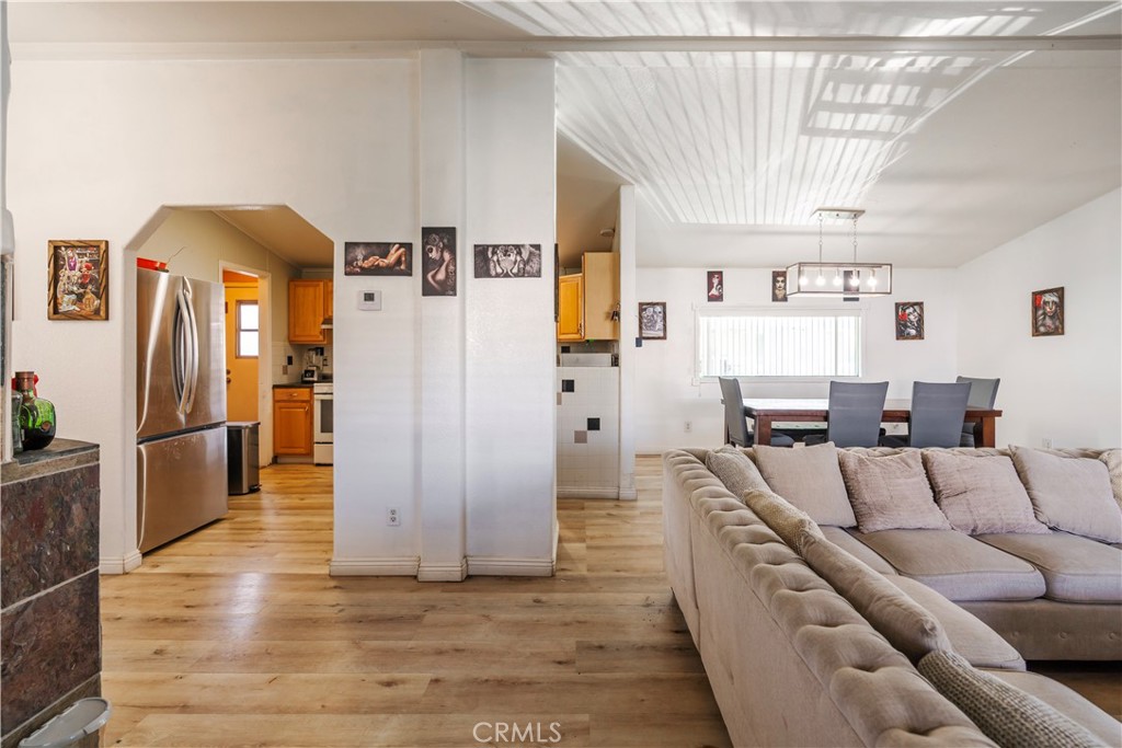 10350 Base Line Road, Unit 192 Rancho Cucamonga, CA 91701 - Photo 9 of 35 a living room with furniture and a kitchen view