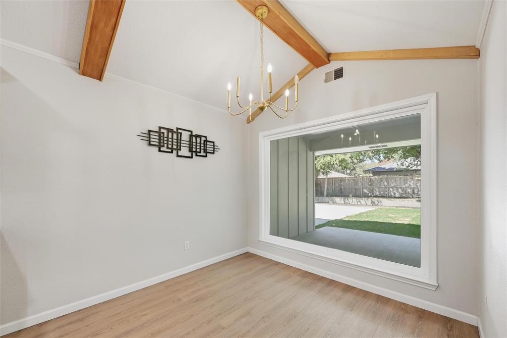 2709 Quail Ridge Drive Carrollton, TX 75006 - Photo 11 of 28 a view of entryway with wooden floor