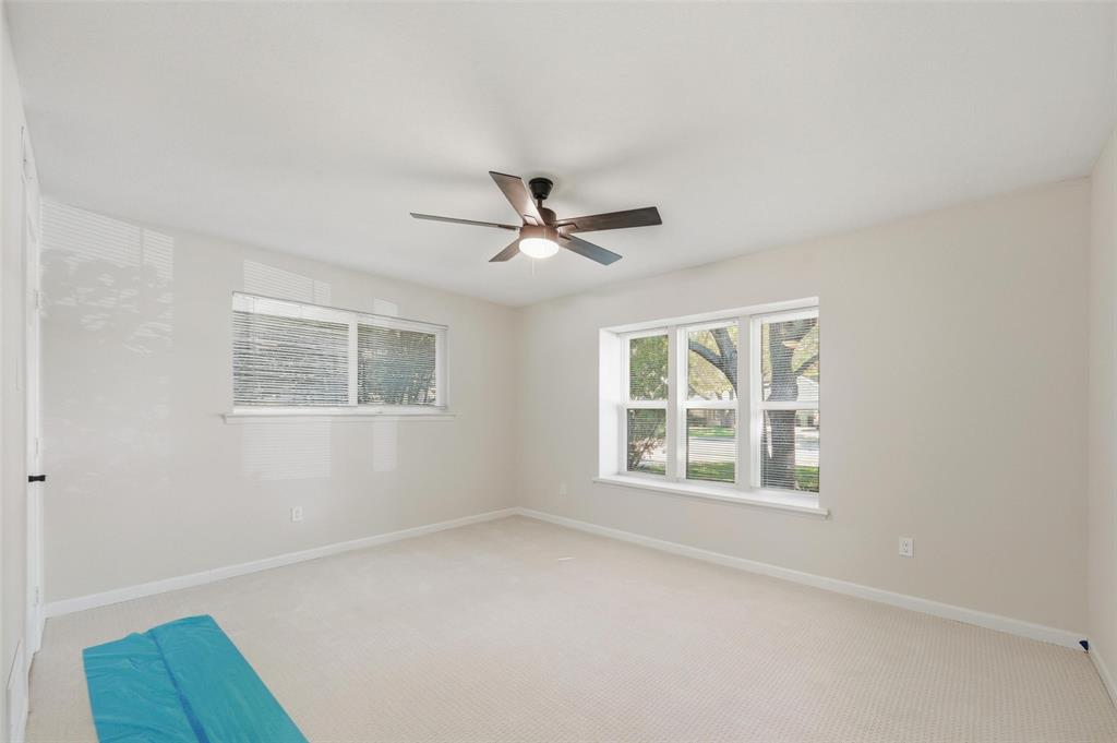 2709 Quail Ridge Drive Carrollton, TX 75006 - Photo 17 of 28 a view of an empty room with a window