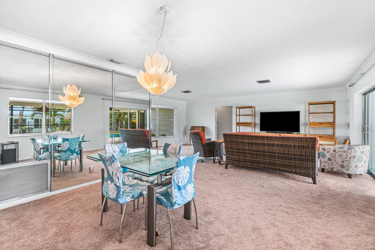 1350 Southwest 13th Place Boca Raton, FL 33486 - Photo 12 of 26 a view of a dining room with furniture