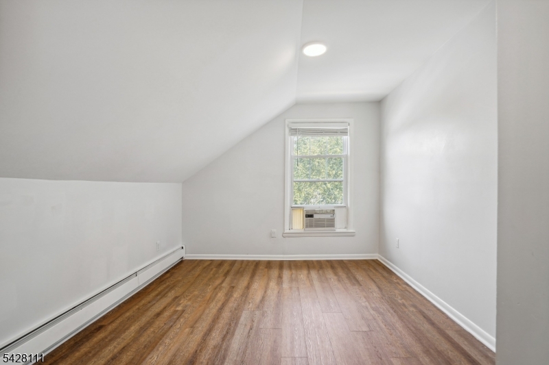 60 2nd Street South Orange, NJ 07079 - Photo 13 of 18 an empty room with a window