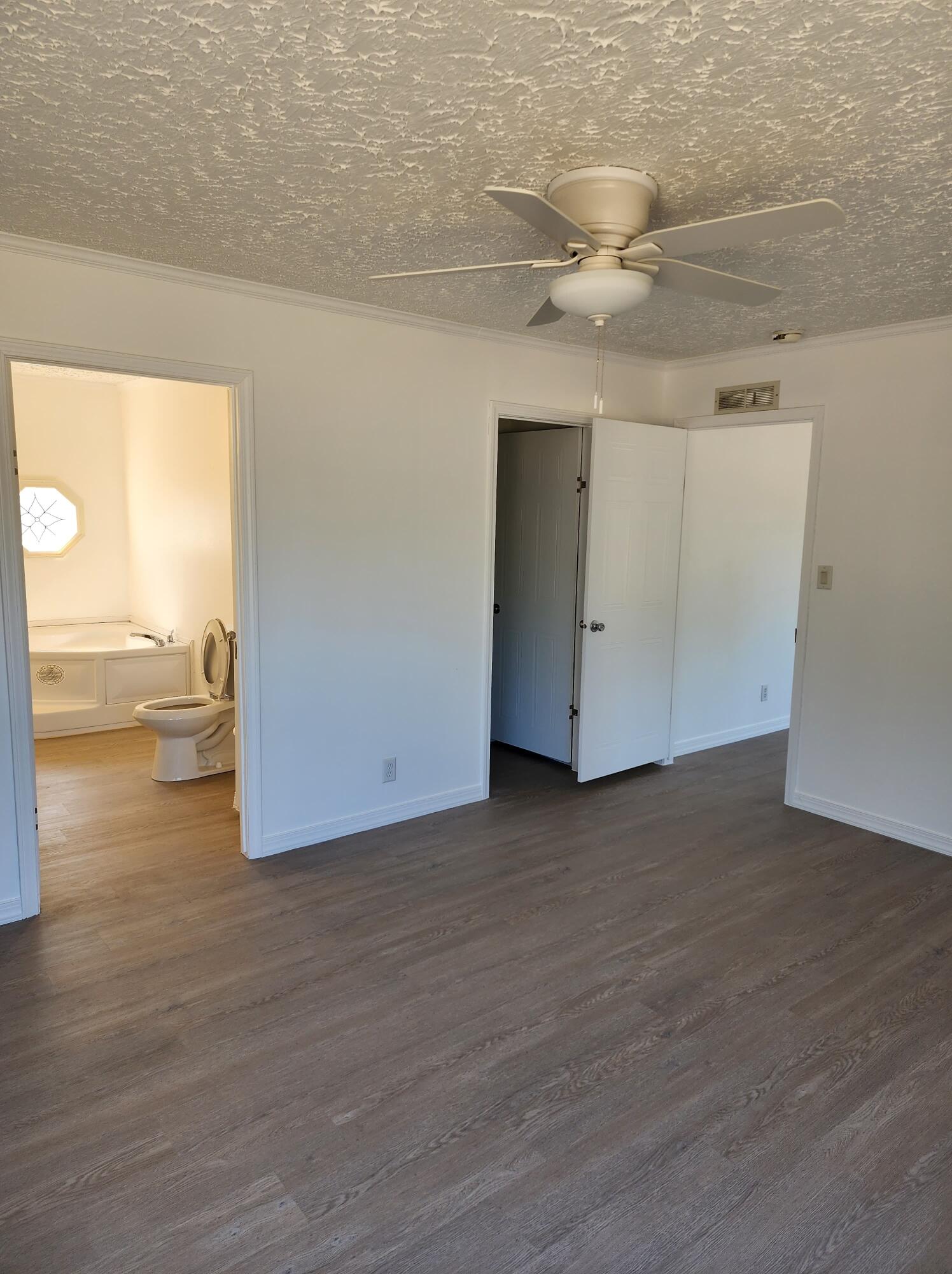 268 Don Graff Road Freeport, FL 32439 - Photo 10 of 20 a view of a room with wooden floor