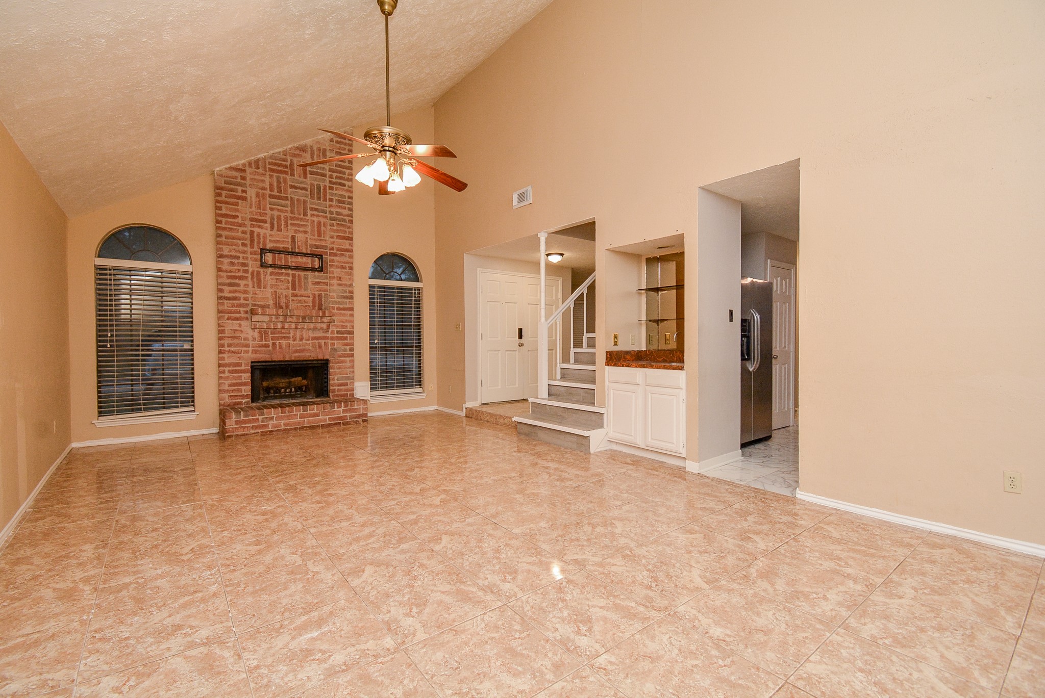 22906 Indian Ridge Drive Katy, TX 77450 - Photo 6 of 26 a view of a livingroom with a fireplace