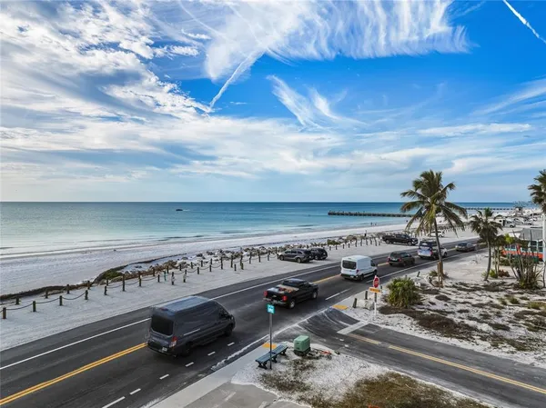a view of a ocean with beach and ocean view