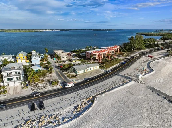 a view of a yard with an ocean view
