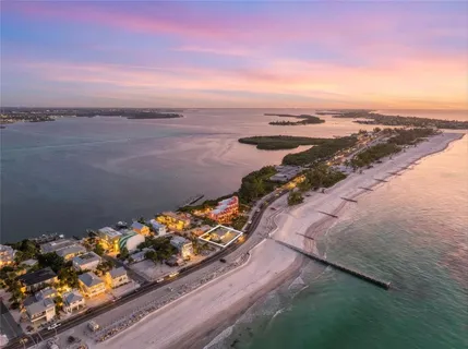 a view of a lake with a yard