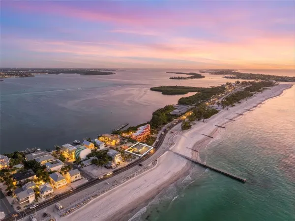 a view of a lake with a yard
