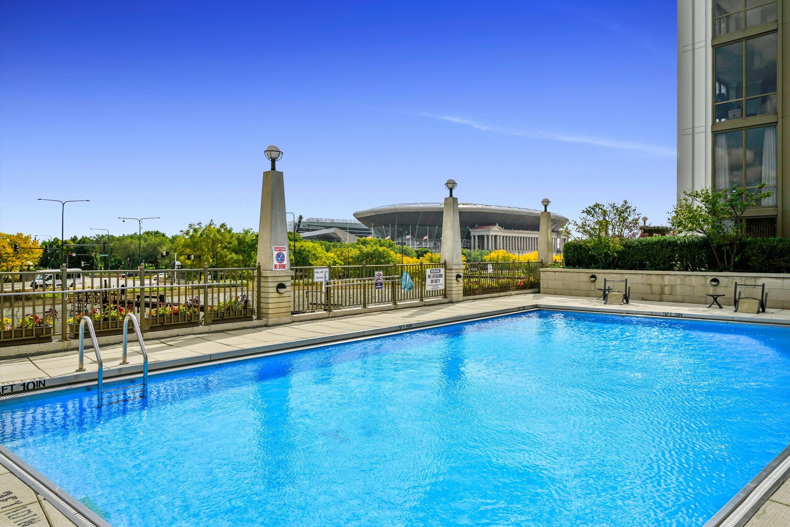 125 East 13th Street, Unit 601 Chicago, IL 60605 - Photo 23 of 25 a view of a swimming pool with an ocean view