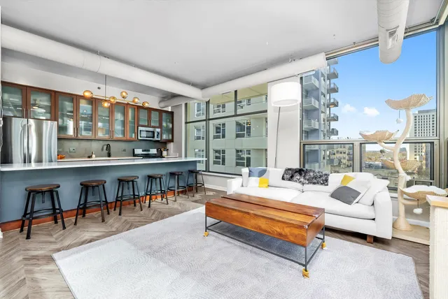 a living room with furniture and a table