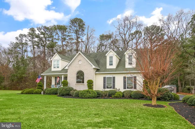 front view of a house and a yard