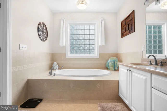 a bedroom with a bed and a table in it