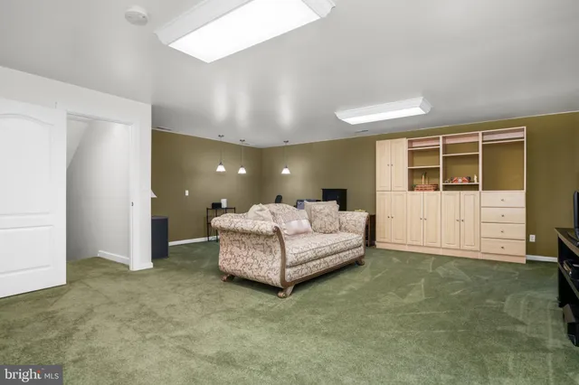 a view of a balcony with wooden floor