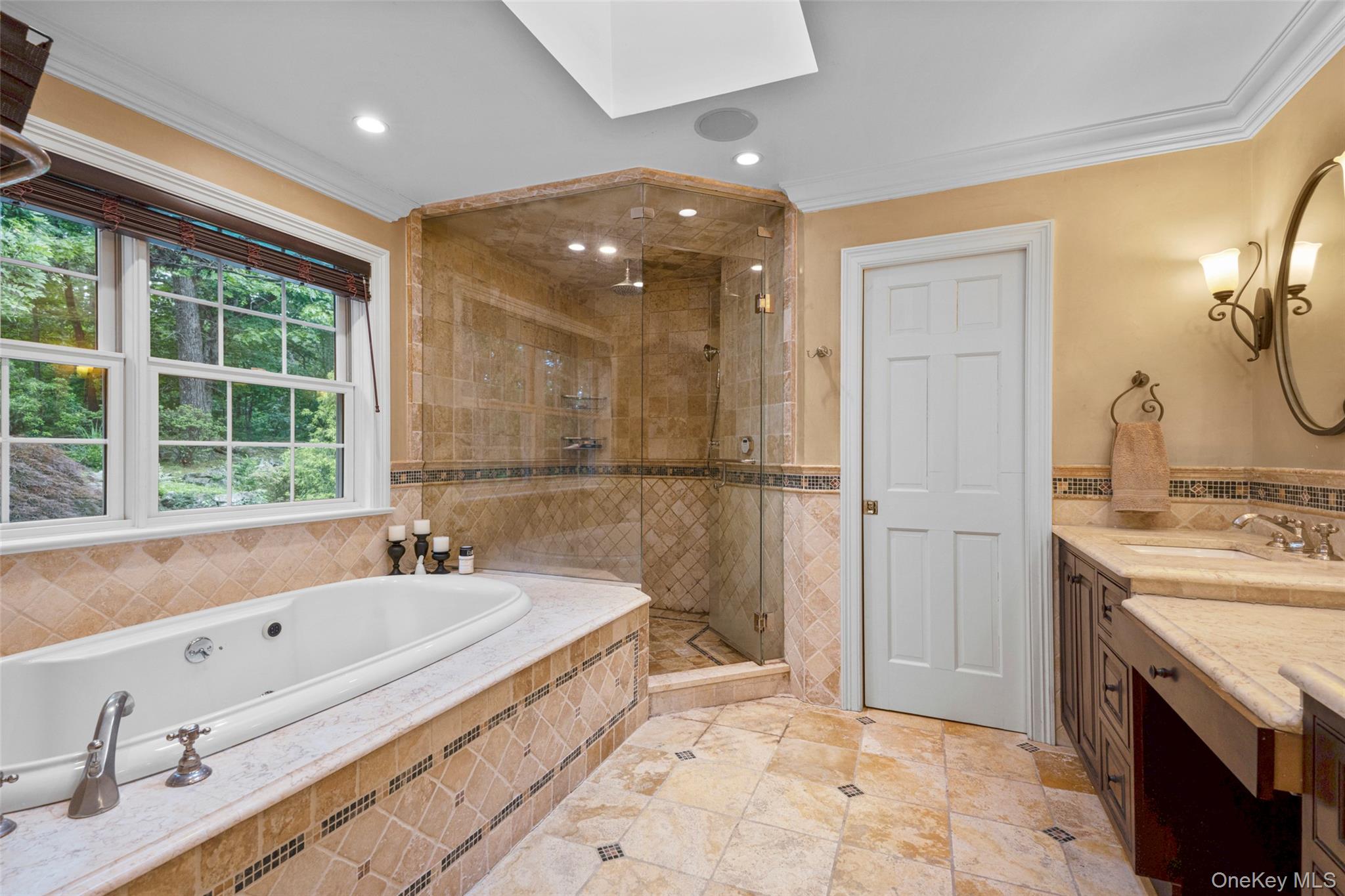 32 Country Road Mamaroneck, NY 10543 - Photo 11 of 35 Ensuite Primary Bathroom with steam shower and radiant heat
