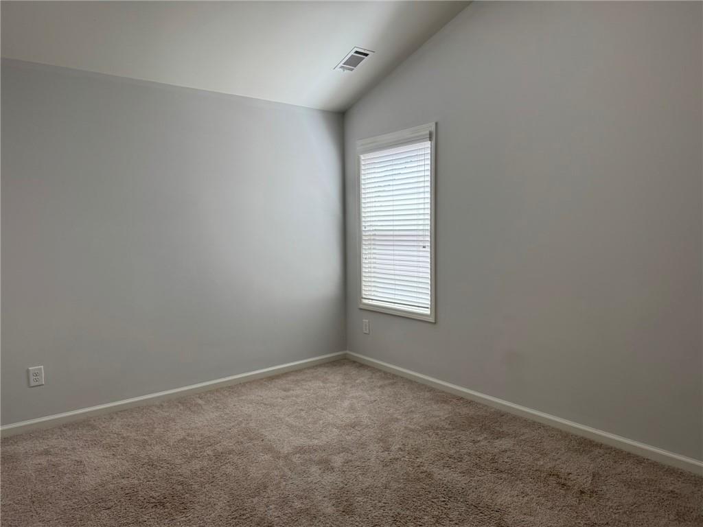 5414 Long Branch Way Flowery Branch, GA 30542 - Photo 20 of 37 an empty room with a window