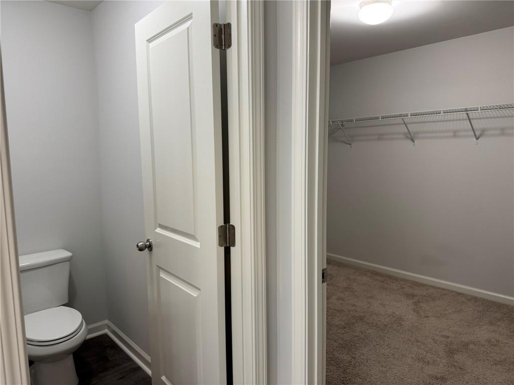 5414 Long Branch Way Flowery Branch, GA 30542 - Photo 27 of 37 a bathroom with a toilet and a shower