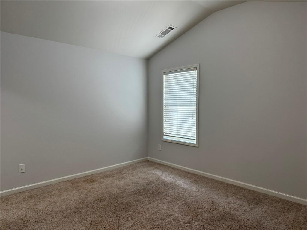 5414 Long Branch Way Flowery Branch, GA 30542 - Photo 34 of 37 an empty room with a window