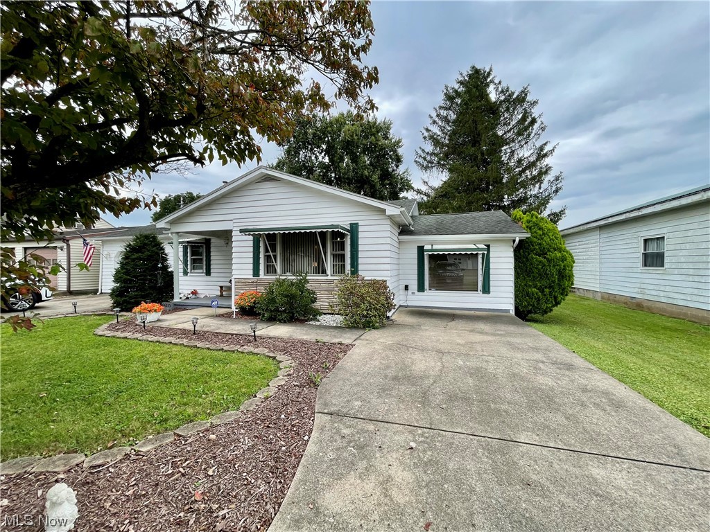66119 Highway 124 Reedsville, OH 45772 - Photo 26 of 29 View of front of house with a front yard