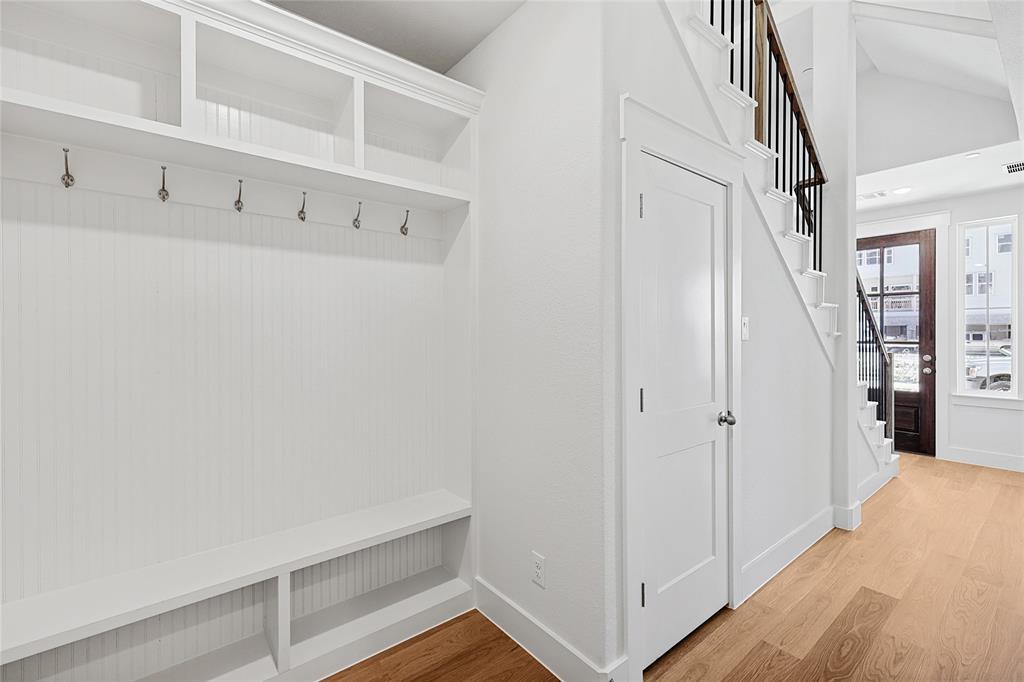 809 Concan Drive Plano, TX 75075 - Photo 17 of 40 Mudroom featuring light wood-type flooring
