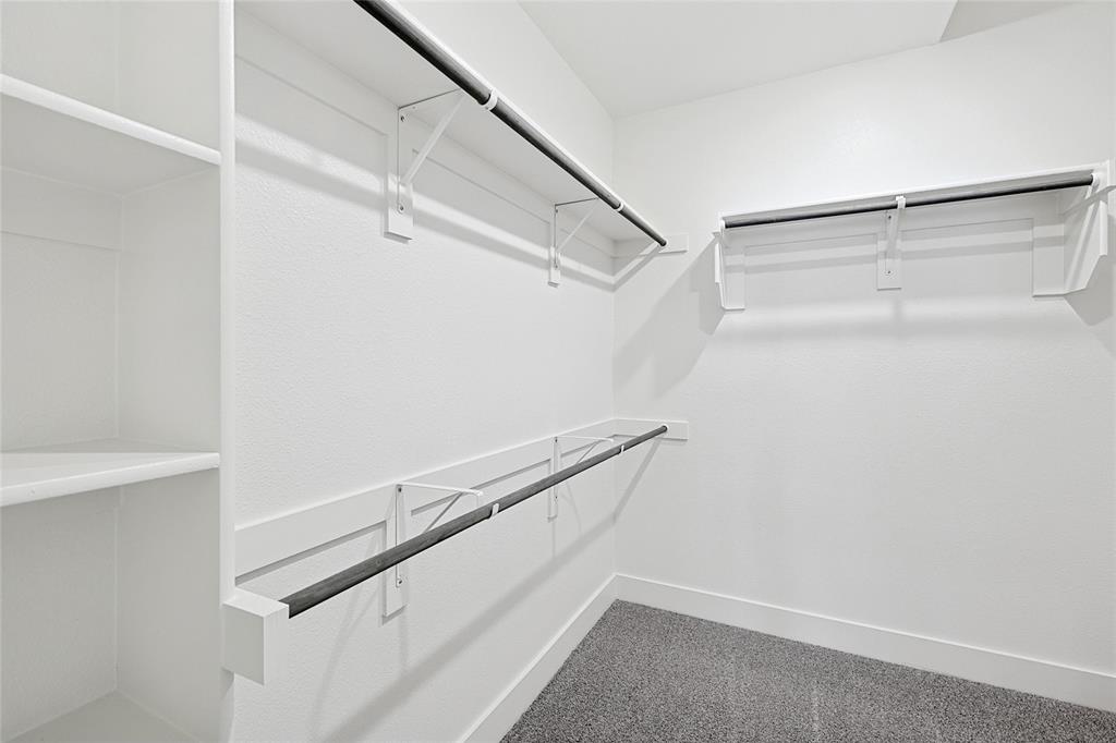 809 Concan Drive Plano, TX 75075 - Photo 23 of 40 Walk in closet with carpet flooring
