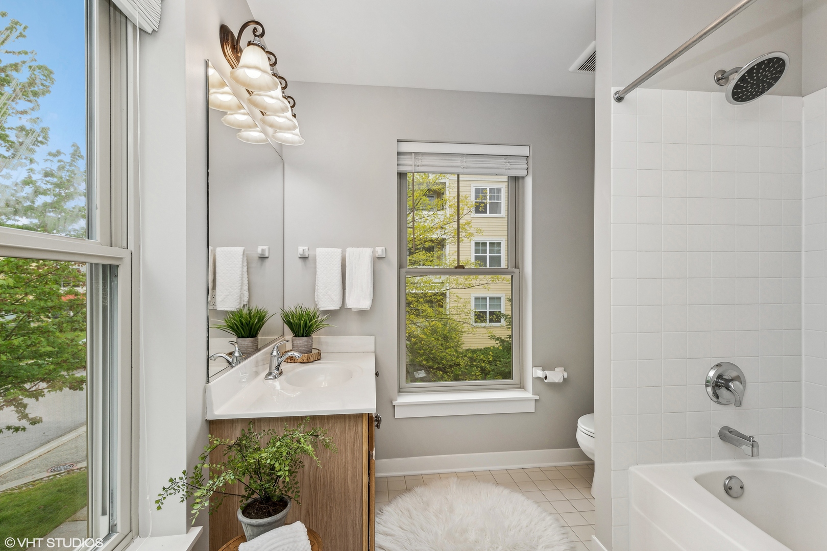 1007 Harris Road Grayslake, IL 60030 - Photo 14 of 32 a bath room with a bath tub and a shower