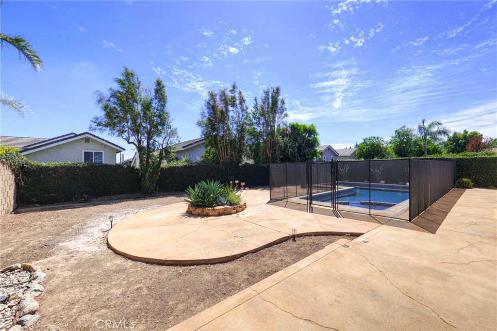 9841 Golden Arrow Lane Rancho Cucamonga, CA 91701 - Photo 32 of 53 a view of a backyard