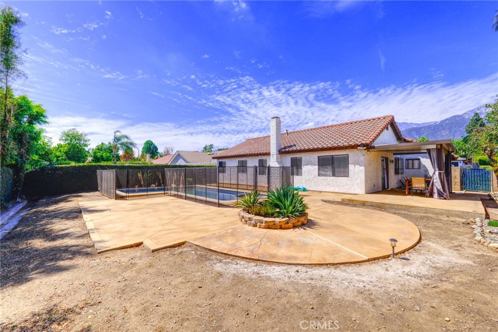 9841 Golden Arrow Lane Rancho Cucamonga, CA 91701 - Photo 37 of 53 a view of a house with entertaining space